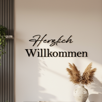 Schriftzug aus holz, herzlich willkommen in schwarz