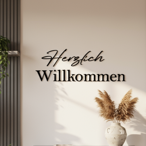 Schriftzug aus holz, herzlich willkommen in schwarz
